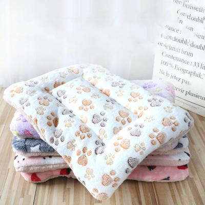 China Cute Warm Thick Dog Mats Pet Beds Winter Breathable Cartoon Paw Printing Plush Cotton Flannel Sleep Blankets for sale