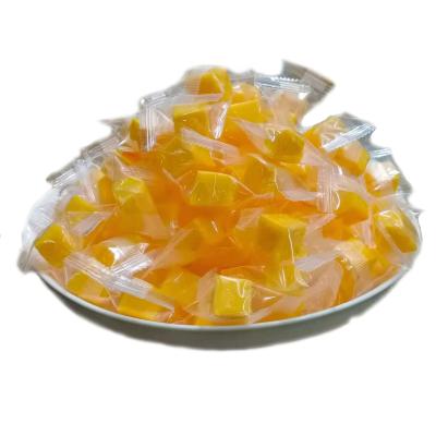 China Rich Mango Flavored Cool Dry Square Sweet Orange Mango Natural Soft Candy Mango Chewy Dice for sale