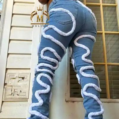 China Fashion Breathable Women Jeans Washed Down Patchwork Jeans Pants Women Street Distressed Casual Pants For Ladies for sale