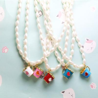 China 2021 Trendy Rainbow Bohemian Fashion Titanium Steel Vacuum Bead Necklaces Plated Enamel Water Cup Love Brass Necklace for sale