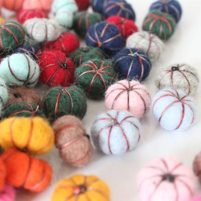 China Material cute handmade color pumpkin blend wool felt poking finished products headdress diy clothing for sale