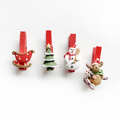 China Professional Christmas Decorative Wooden Peg Resin Clips from Europe Manufacturer for sale