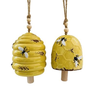 China Unique Natural Melody Ceramic Bells The Sublimation Art Deco Fairy Deep Tone Sympathy Bee Wind Chimes For Sale for sale