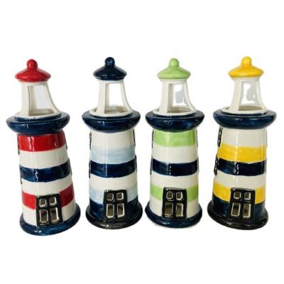 China Handmade Art Craft Ceramic Lighthouse Shaped Lantern Tea Lights Candle Holder Home Decoration Plant for sale