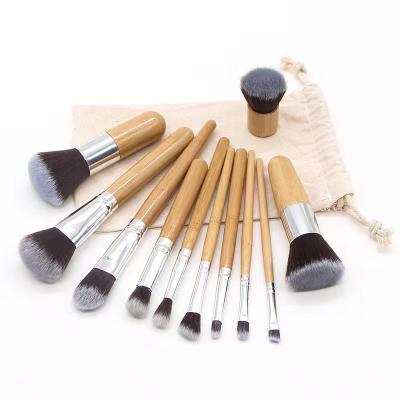 China 11pcs Environmental Protection Professional Bamboo Handle Premium Makeup Brush Set With Canvas Bag for sale