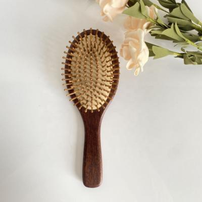 China Eco-friendly Natural Rubber Air Massage Cushion Paddle Waterproof Eco-friendly Wooden Hair Brush for sale