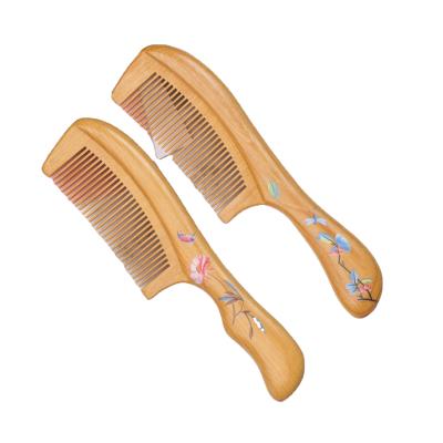 China Low MOQ 100% Natural Wood Detangle Graphic Natural Comb Eco-friendly Beautiful for sale