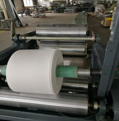 China Factory Absorbent Cotton Roll And Slitter Fully Automatic Equipment For Producing Cotton Roll for sale