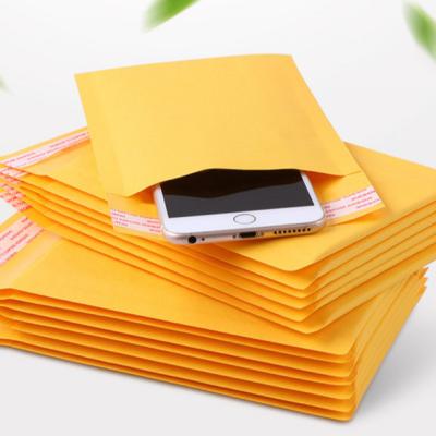 China Kraft Paper Chemical Yellow Bubble Waterproof And Pressureproof Jewelry Packaging Bag Express Bubble Bag for sale