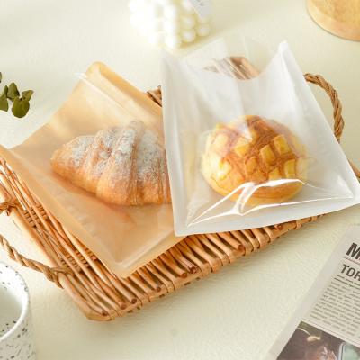 China Transparent Food Stock Bread Kraft Paper Bag Small Donut Croissant Bakery Baked Disposable Food Bags for sale