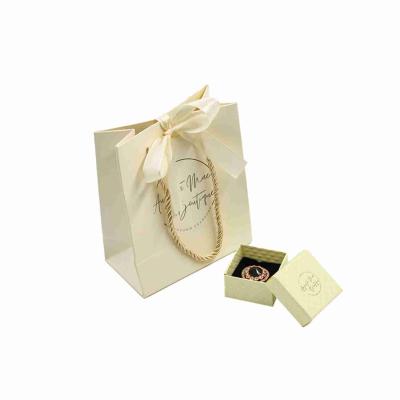 China ISO Recyclable White Cardboard Gift Bags Small Jewelry Paper Bags With Your Own Logo for sale