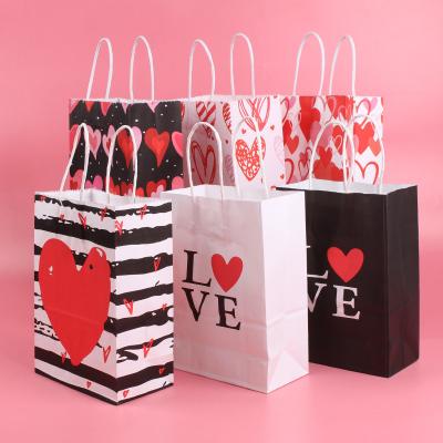 China Red And Pink Shopping Paper Gift Bag Custom Logo For Valentines Day for sale