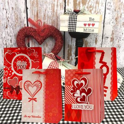 China Kraft Paper Valentines Day Gift Bag With Logo Printed for sale