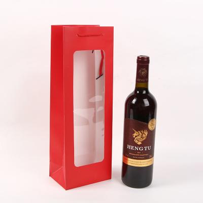 China Rote und schwarze Offsetdruck-Papier-Wein-Geschenk-Taschen mit Griffen zu verkaufen