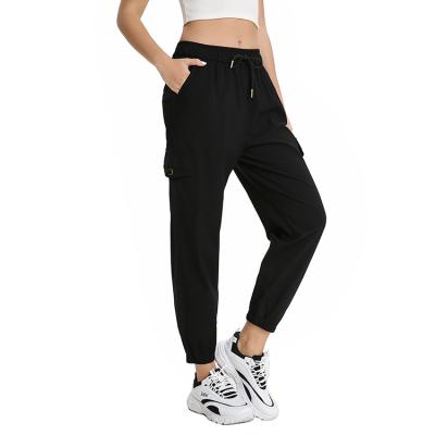 China Yunnes Women Clothing Flap Pocket Black Breathable Loose Elastic Waist Side Casual Cargo Pants for sale