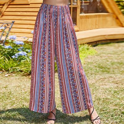 China Summer Breathable Hippie Beach Palazzo Waist Smocked Harem Pants Boho Women Wide Leg Lounge Pants for sale