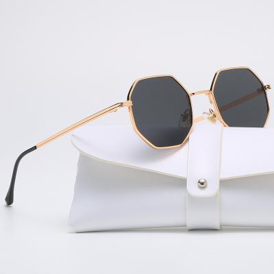 China Fashion sunglasses 2022 luxury glasses ladies sunglasses brand design new fashion metal sunglasses vintage frame ladies men polygonal sunglasses for sale