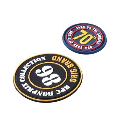 China Sustainable New Design Eco-friendly Customized Embossed Soft Silicone 3D Rubber Patches For Garment PVC Logo Patch for sale