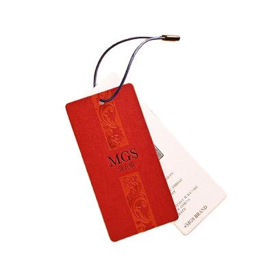 China Sustainable Paper Materials Specialty Manufacturer's New Tag Design Clothes Swing Tag With Opp Bag à venda