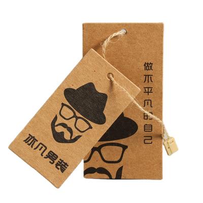 China Viable Factory Wholesale New Design Garment Label Hollow Brown Paper Hanger Tag à venda