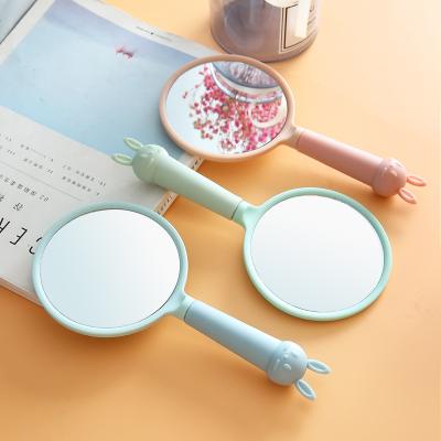 China Children's simple side around the handle hand-held cosmetic mirror cute hand-held cosmetic mirror rabbit rabbit hand-held makeup mirror with handle for sale