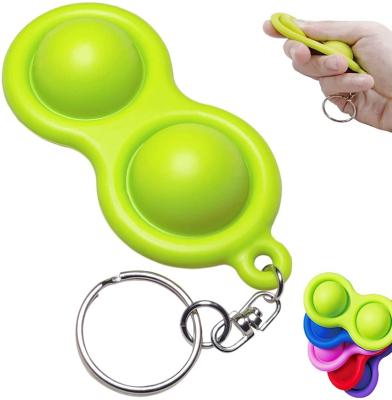 China Durable Key Chain Dimple Sensory Keychain Simple Mini Silicone Brain Fidget Toy Key Rings Gifts For Adults for sale