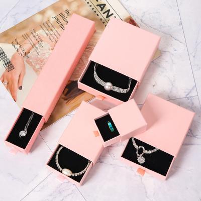 China Custom Logo Cardboard Jewelry Gift Bag Accessories Logo Necklace Drawing Box Package Slide Drawer Paper Box With Black Foam For Jewelry Packaging for sale