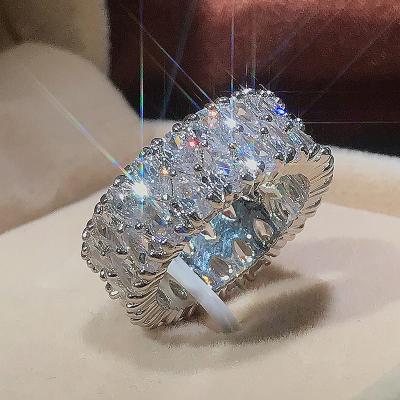 China Non Tarnish Luxury Women Jewelry Round Full Finger Ring Dazzling Double Row Zircon Stone Water Dripping CZ Wedding Ring for sale