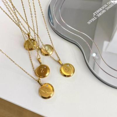 China Non Tarnish A-Z Alphabet Name Letter Carved Round Pendant 18K Gold Plated Zircon Initial Necklace for sale