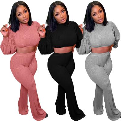 China Women Casual Two Piece Set Solid Color Breathable Casual Flared Pants With High Neck And Bubble Sleeves Female Wear Outfits for sale