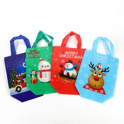 China Eco-friendly Stock Christmas Bag Cheap Cartoon Film Covered Folding Border Advertising Printing Nonwoven Tote Bag for sale