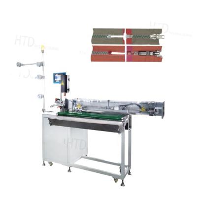 China Garment Shops Machinery HTD Brand Full Automatic Plastic Zipper Cutting Machine For Making Clogged Finished Zipper for sale