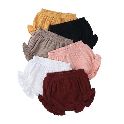 China Amazon Hot Sales Breathable Baby Kids Clothes Summer Solid Color Double Layer Muslin Toddler Girls Ruffle Shorts for sale