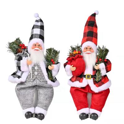 China New Gift Amazon Hot Sale New Resin Christmas Toys With Pine Leaves Santa Claus Sitting Position Doll for sale