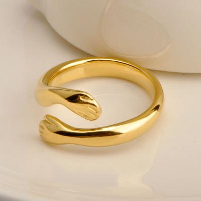 China FASHIONABLE Cute Hands Open Narcissism Hug Me 18K Gold Plated Hand Hugging Hands Hug Ring Women for sale