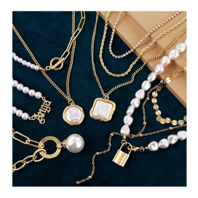 China Trendy Heart Cross Necklaces Butterfly Chain Gold Fashion Pearl Necklace Natural Baroque Freshwater Pearl Necklace For Women for sale