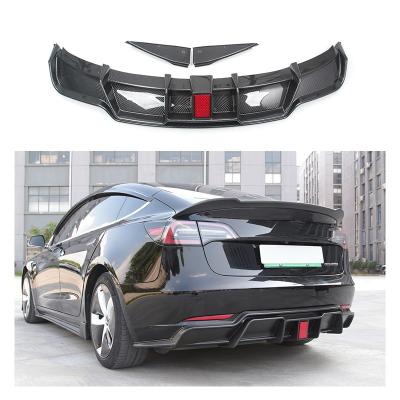 China Hot Selling Black ABS Carbon Fiber Rear Diffuser With Light Body Kit Rear Bumper Lip For Tesla Model 3 for sale