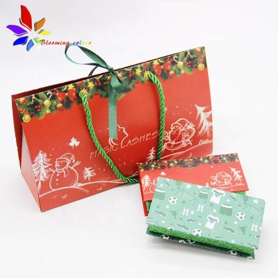 China Recyclable Christmas Triangle Shape Tote Bag Whips Packaging Bags With Logo Printed for sale