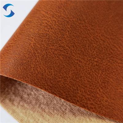 China Breedte 140/160 PVC-leerstof Dikte 0,7 mm±0,05 100% polyester geborstelde rugsteun technieken voor autostoeltjes Te koop