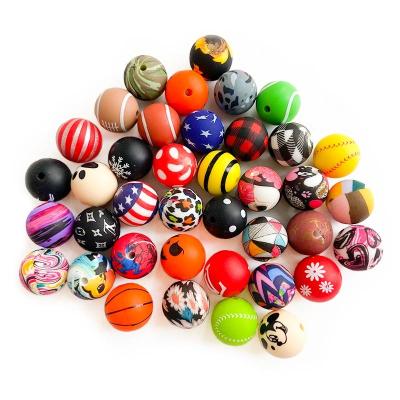 China Soft Toy Printing Designs Food Grade Leopard Print Silicone Beads  15mm Silicone Printed Beads Chewable Round Baby Teething Beads for sale