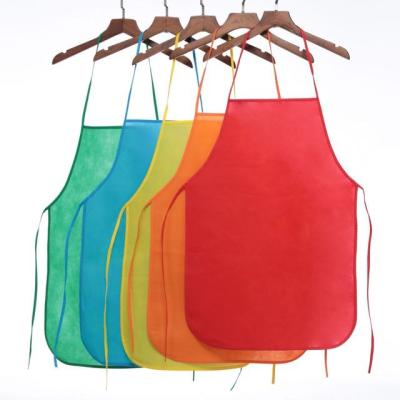 China Nonwoven Fabric Factory Direct Selling OEM Customized Disposable Apron Anti Dirty Nonwoven Kids Cooking Apron Kids Draw Apron for sale