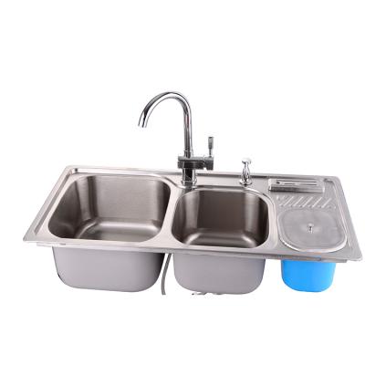 China Sus 304 Stainless Steel Kitchen Sink One Piece Pedestal Compound Faucet Modern Drainless Stretch Strainer for sale