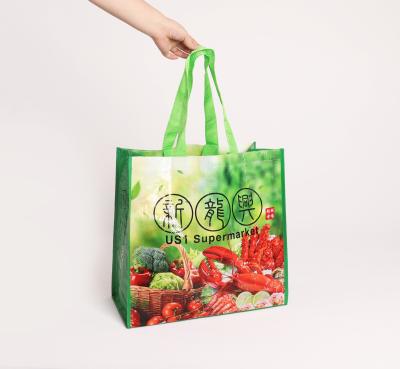 China Custom Logo Promotional Goods Packaging Colorful Handled PP Laminated Plastic Woven Tote Bag With Two Shopping Type Handle for sale