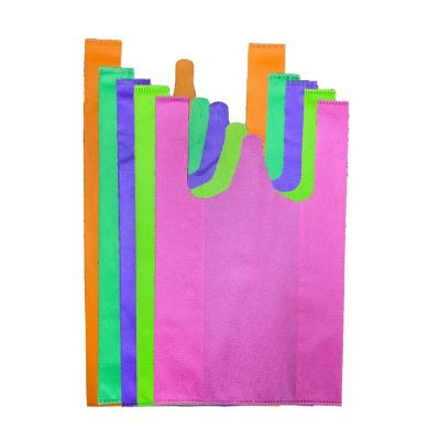 China Colorful L# Disposable T-shirt Stable Strong Foldable Ultrasonic Nonwoven PP Nonwoven Bag for sale