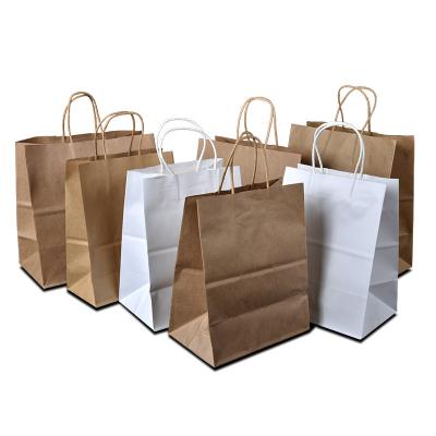 China 100% Personalized Eco-Friendly Brown Paper Bag Handy Craft Kraft Paper Bag Custom Logos for sale