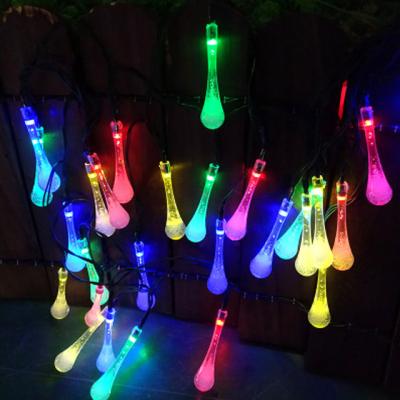 China Hot Sale IP65 Amazon Garden Waterproof Outdoor Festival Holiday RGB LED Solar Colorful Stake Garden Waterdrop String Light for sale