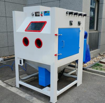 China Garment shops automatic turntable sand blasting device for sale