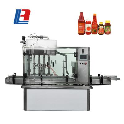 China Beverage Newly Produced Essential Oil Rotary Monoblock Desktop Automatic Filling Capping Machine for sale