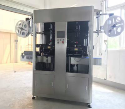 China Beverage high quality double head shrink sleeve labeling machine price is suitable for food and drink, medical and cosmetics for sale