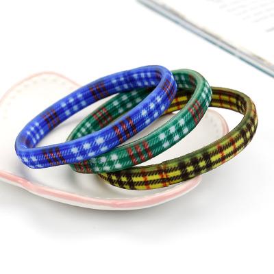 China Korea style hair rubber band sales women solid color plaid design elastic hair bands European and American style hot flat scrunchies for girls for sale